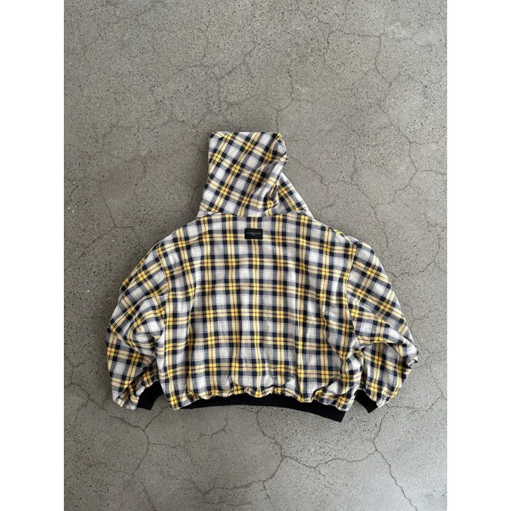 Black hooded zip jacket with checked lining and front pockets