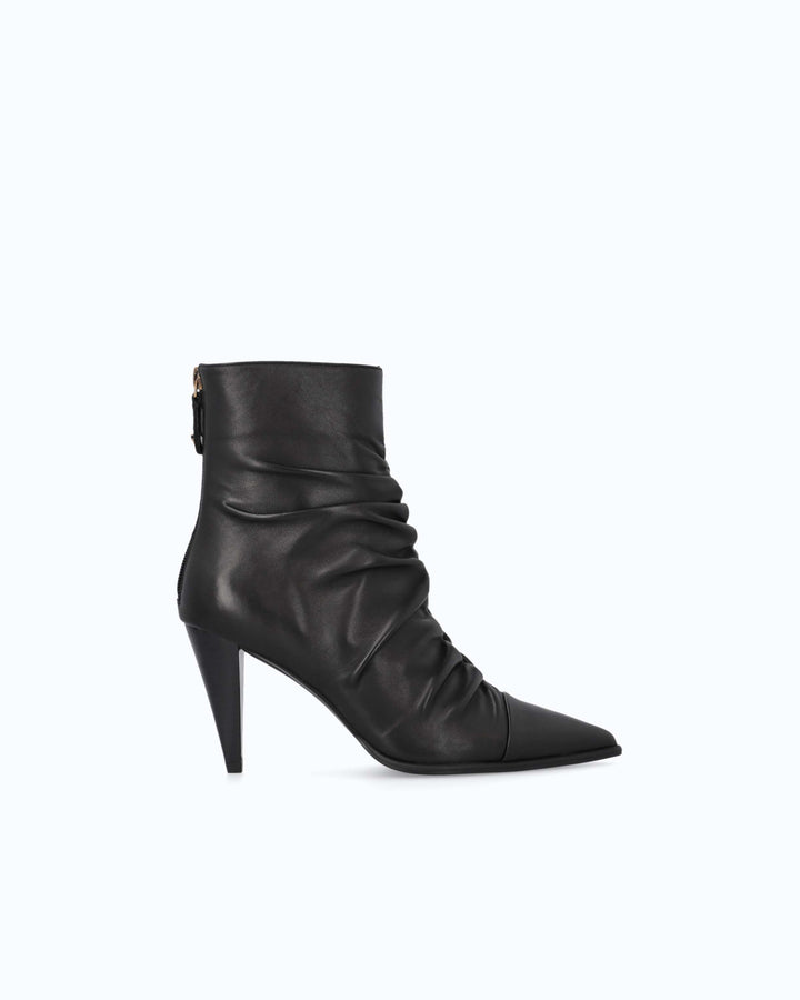 Black ruched ankle boots with pointed toes and high stiletto heels