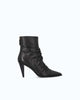Black ruched ankle boots with pointed toes and high stiletto heels