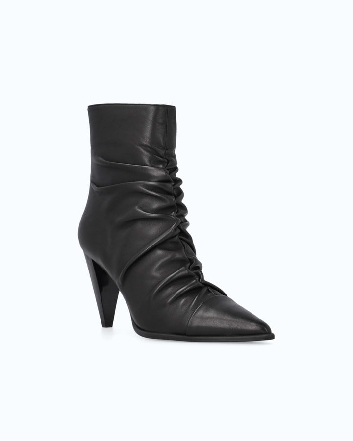 Black ruched ankle boots with pointed toes and high stiletto heels