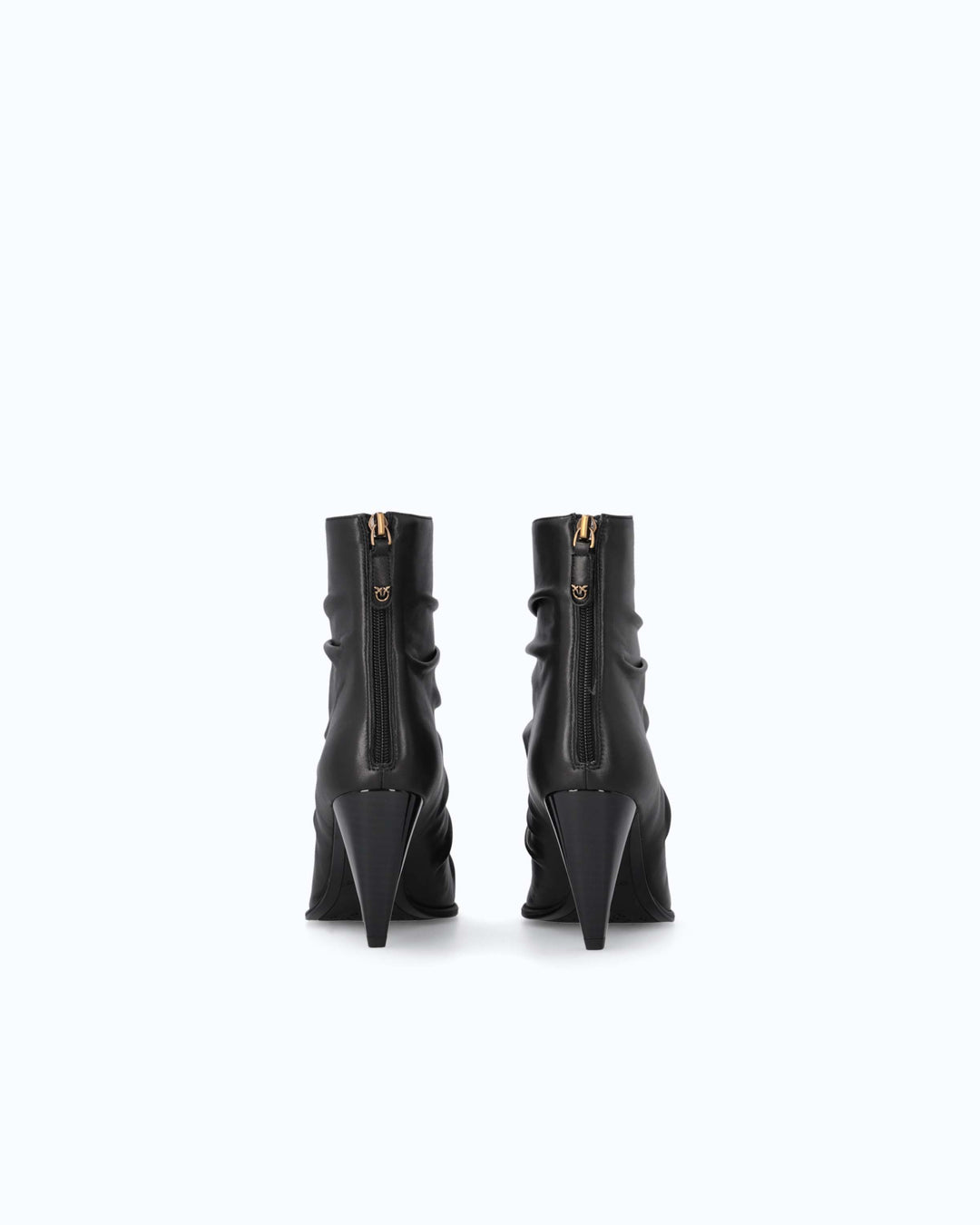 Black ruched ankle boots with pointed toes and high stiletto heels