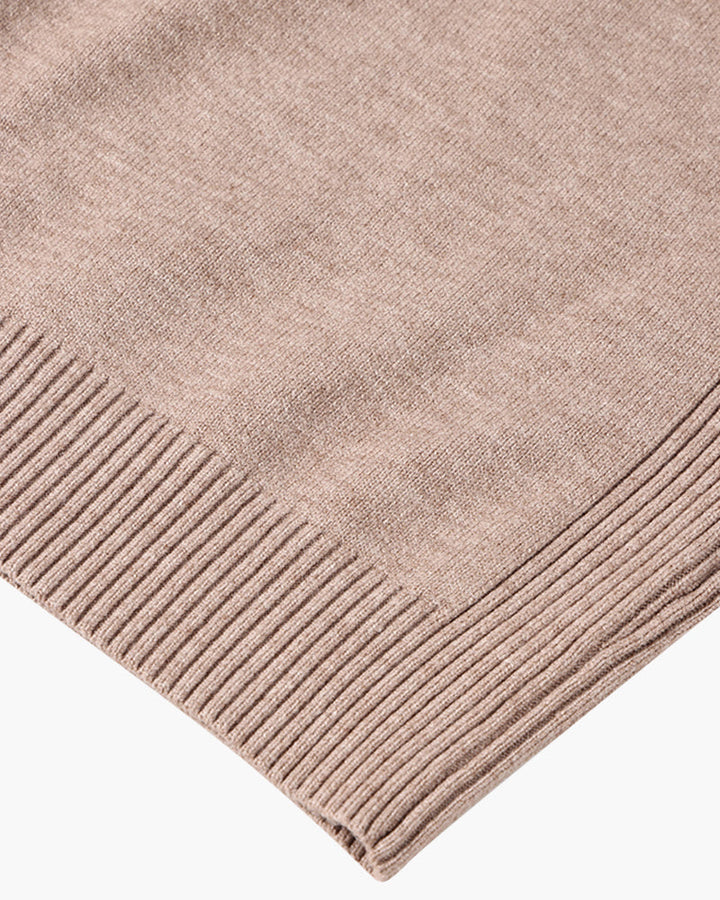 Women's ribbed turtleneck sweater with long sleeves and fitted hip-length cut