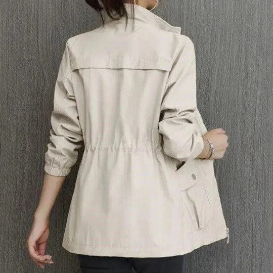Women's lightweight trench jacket with stand collar and flap pockets
