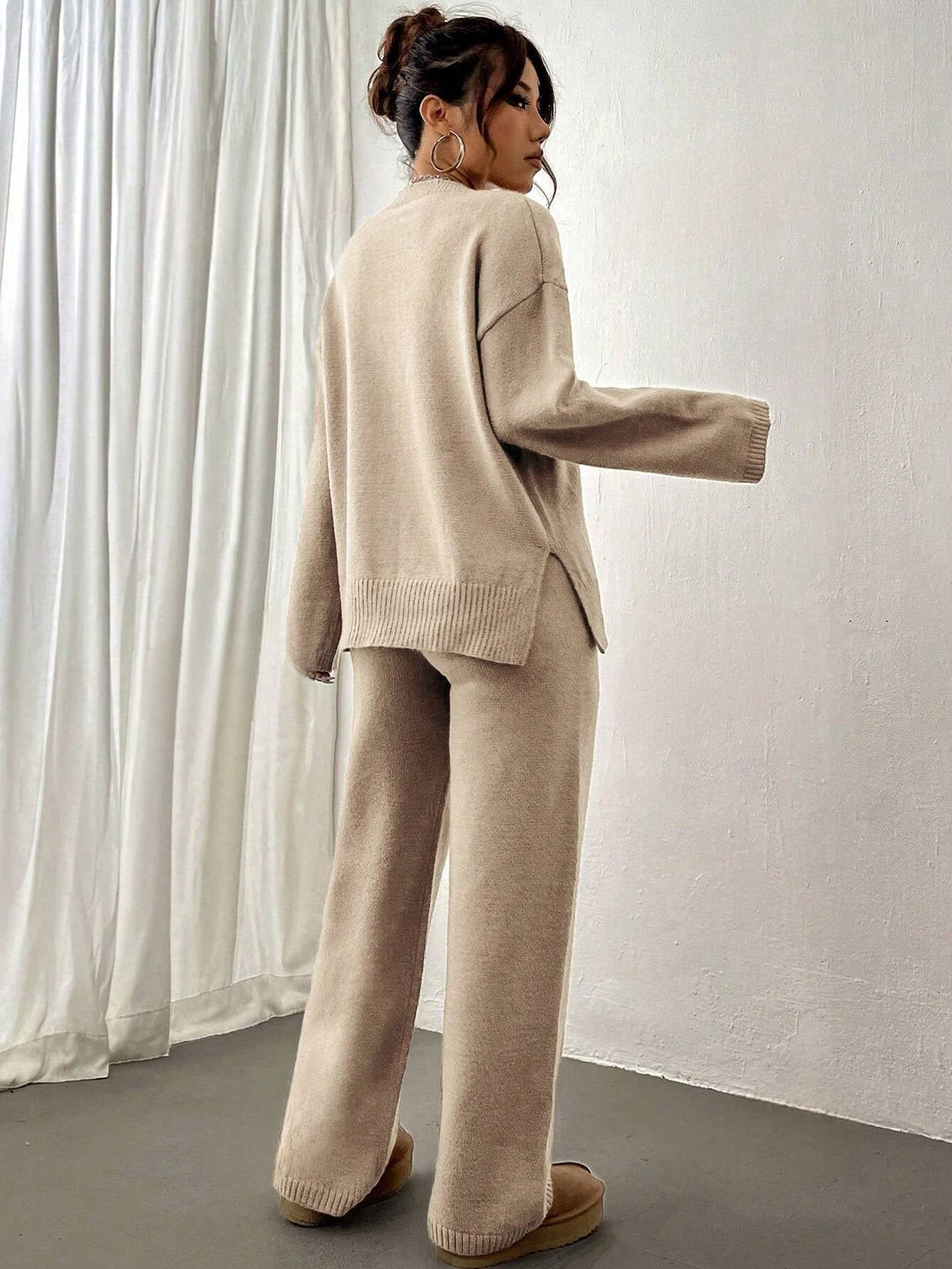 Women's knitted crew-neck sweater and matching trousers set