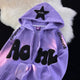 Women's hooded zip-up hoodie with raised text appliqués, star patches and kangaroo pocket