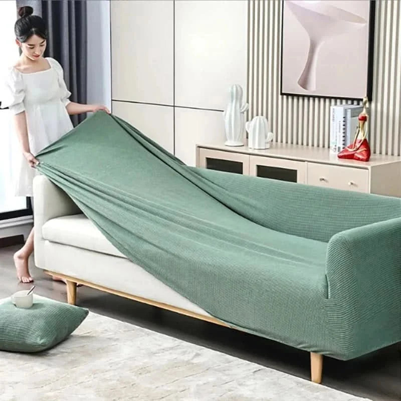 Textured stretch sofa slipcover on living room seating