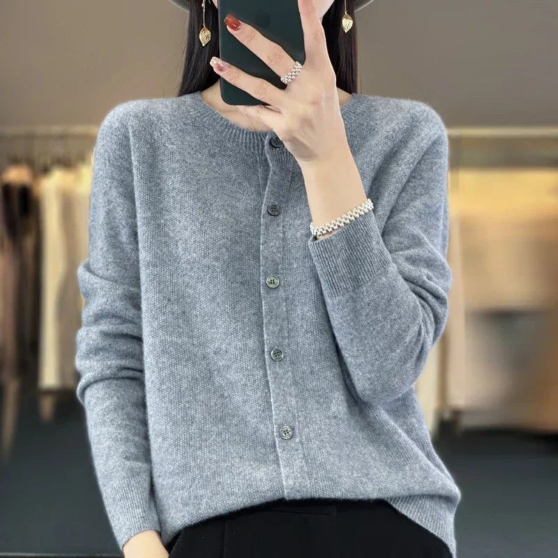 Women's crew neck knit cardigan with long sleeves and button front