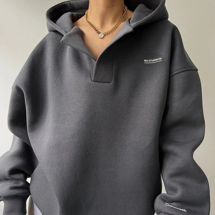 Women's hooded split-neck pullover with long sleeves