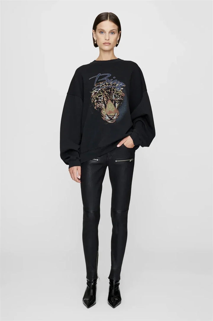 Women's long sleeve crew neck sweatshirt with front graphic detail