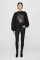 Women's long sleeve crew neck sweatshirt with front graphic detail