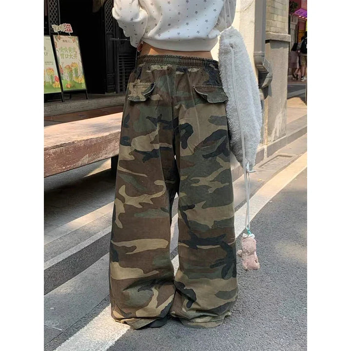 Women's wide leg camouflage trousers with drawstring waist and yellow graphic text