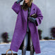 Women's long oversized lapel coat with button front and angled pockets