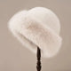 Women's fluffy fur-textured winter hat with rounded crown and wide brim