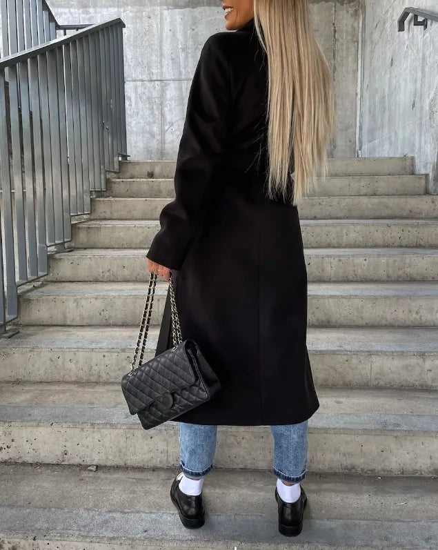 Women's long double-breasted trench coat with belt and lapels