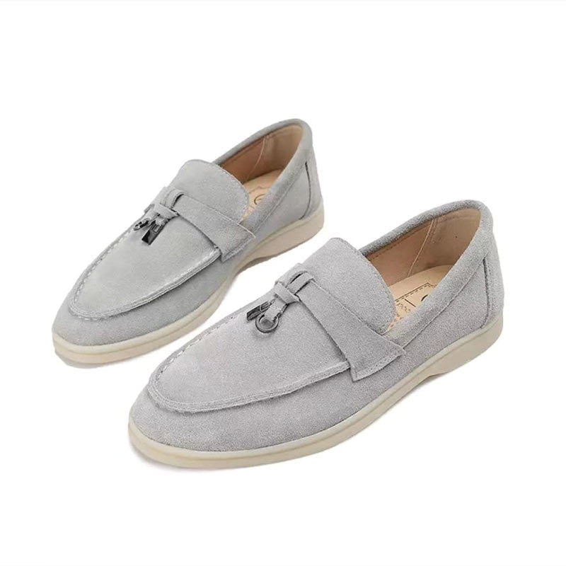 Women's pointed toe loafers with tassel detail