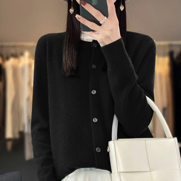 Women's crew neck knit cardigan with long sleeves and button front