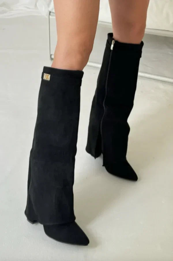 Women's tall pointed toe heeled boots with side zip and buckle detail