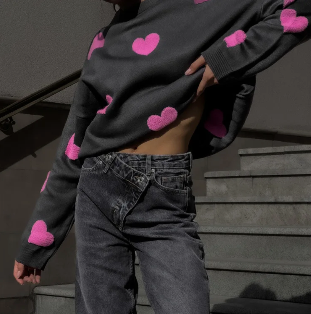 Women's patterned knit sweater with crew neck, long sleeves and contrasting motifs
