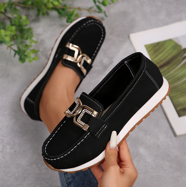 Women's moc toe loafers with decorative buckle and flat platform sole