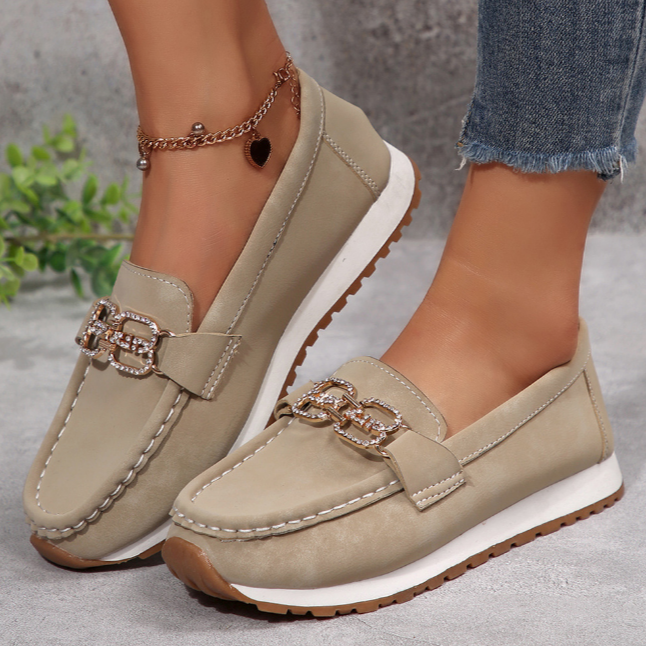 Women's moc toe loafers with decorative buckle and flat platform sole