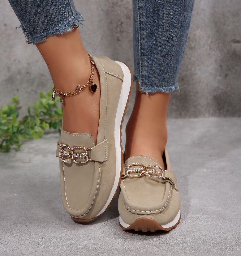 Women's moc toe loafers with decorative buckle and flat platform sole