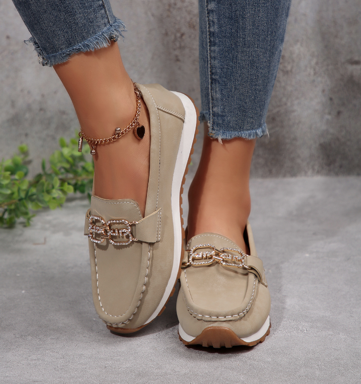 Women's moc toe loafers with decorative buckle and flat platform sole