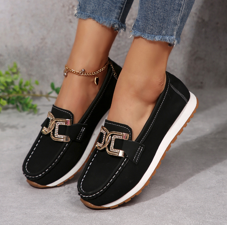 Women's moc toe loafers with decorative buckle and flat platform sole