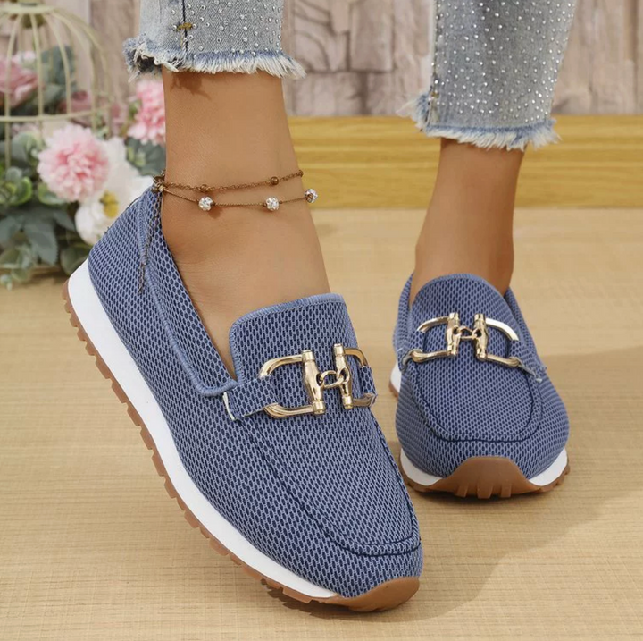 Women's loafer sneakers with metal bar detail and flat textured sole