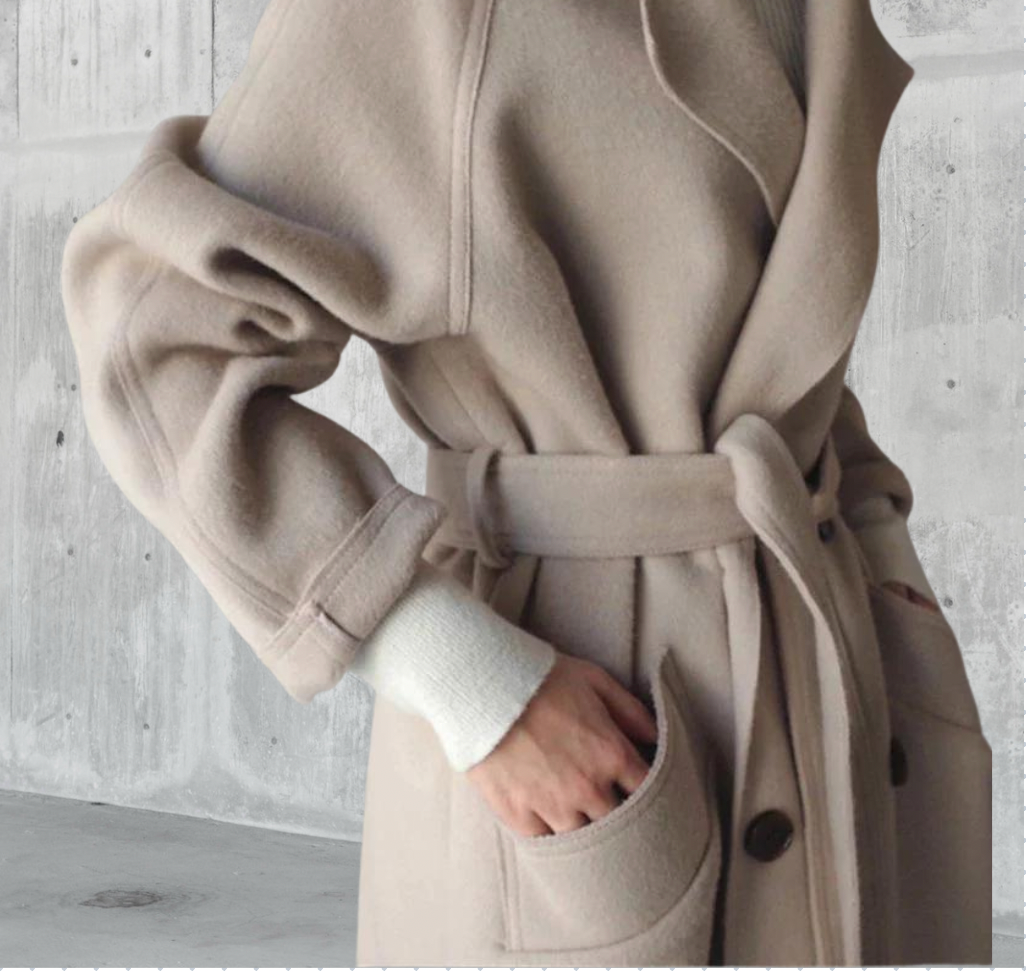 Women's longline button-front coat with notched lapels and side pockets