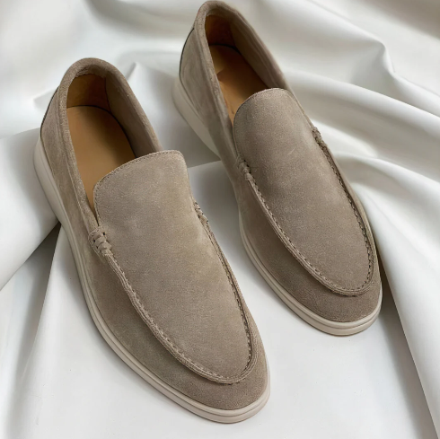 Men's slip-on loafers with rounded moc toes and flat layered soles