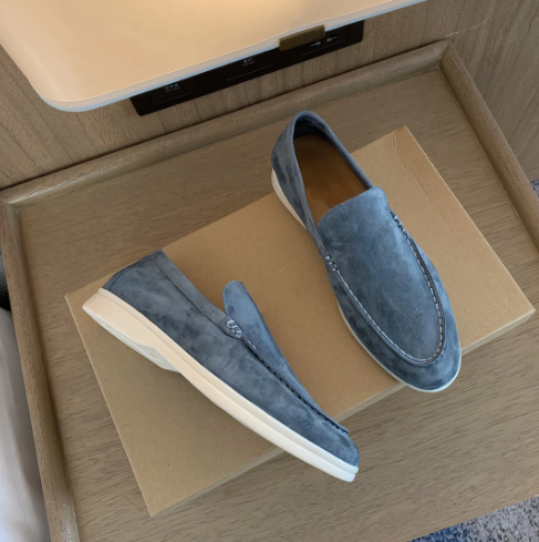 Men's slip-on loafers with rounded moc toes and flat layered soles