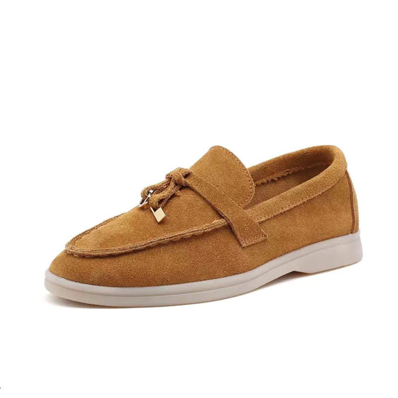 Women's pointed toe loafers with tassel detail
