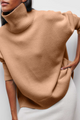 Women's oversized turtleneck sweater with ribbed trims and three-quarter sleeves
