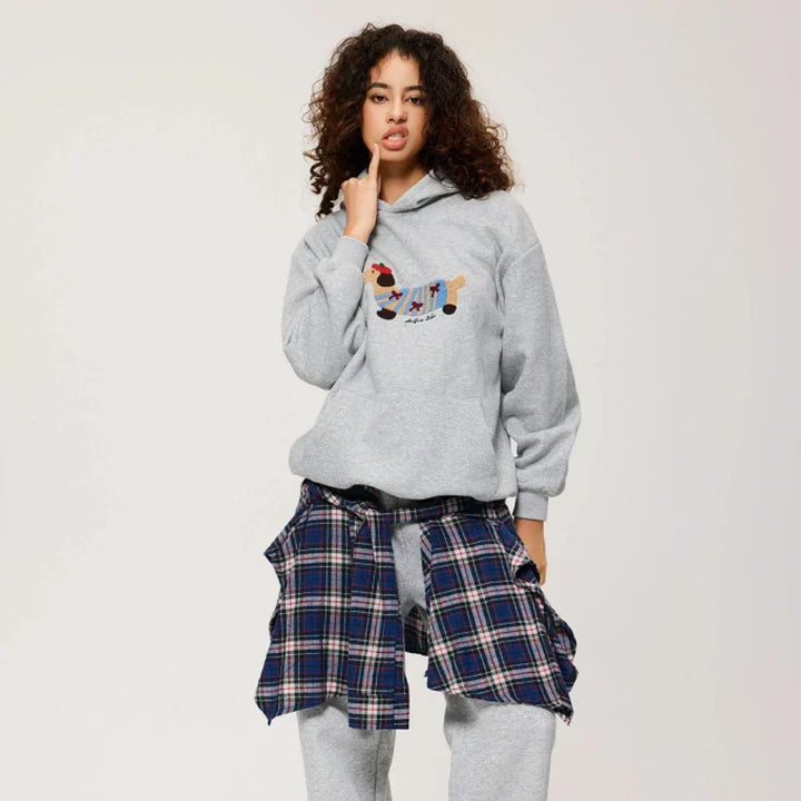 Women's pullover hoodie with dog graphic, hood, long sleeves and kangaroo pocket