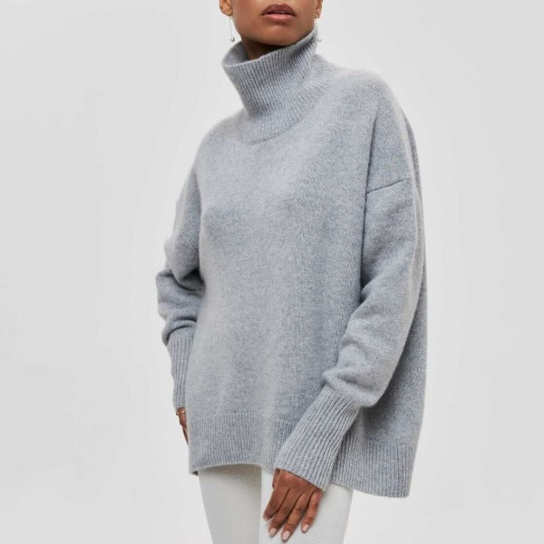 Women's relaxed turtleneck sweater with long sleeves and ribbed trims