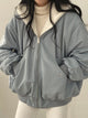 Women's relaxed winter jacket with sherpa-style lining, zipper front and long sleeves