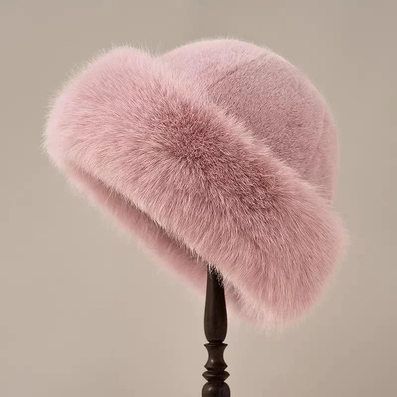 Women's fluffy fur-textured winter hat with rounded crown and wide brim
