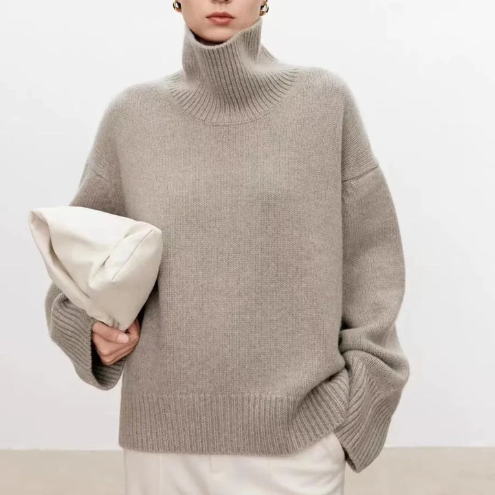 Women's plain knit turtleneck sweater with ribbed collar and long sleeves