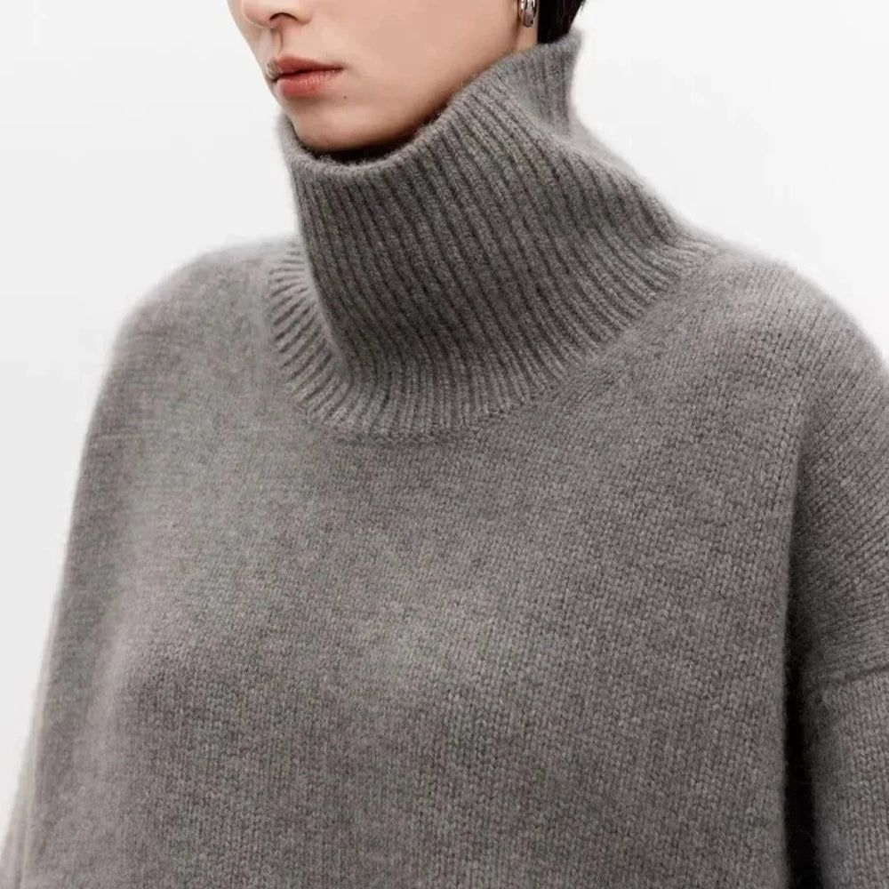 Women's plain knit turtleneck sweater with ribbed collar and long sleeves