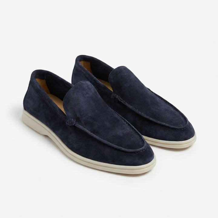 Men's slip-on loafers with stitched toe detail and contrast soles