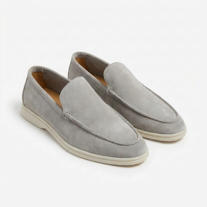 Men's slip-on loafers with stitched toe detail and contrast soles