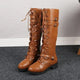 Women's knee-high lace-up boots with buckle straps and low heels