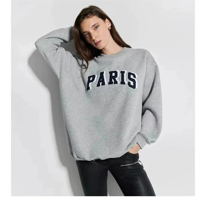Women's long sleeve crew neck sweatshirt with front graphic detail