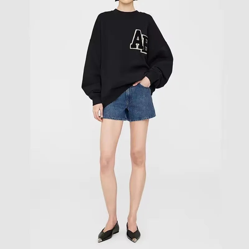 Women's long sleeve crew neck sweatshirt with front graphic detail