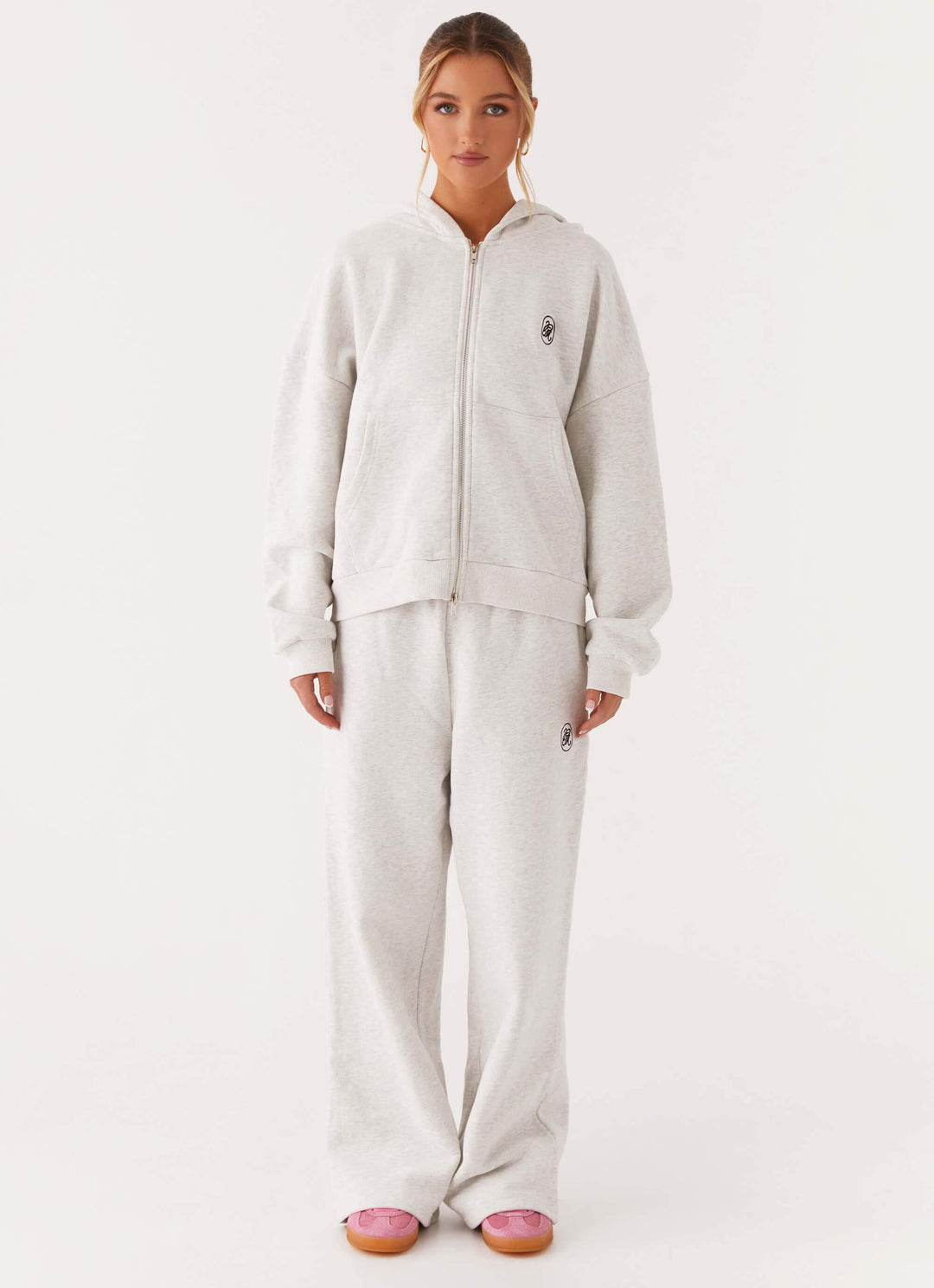 Women's grey hooded zip-up hoodie with front pockets
