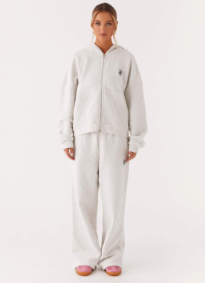 Women's grey hooded zip-up hoodie with front pockets