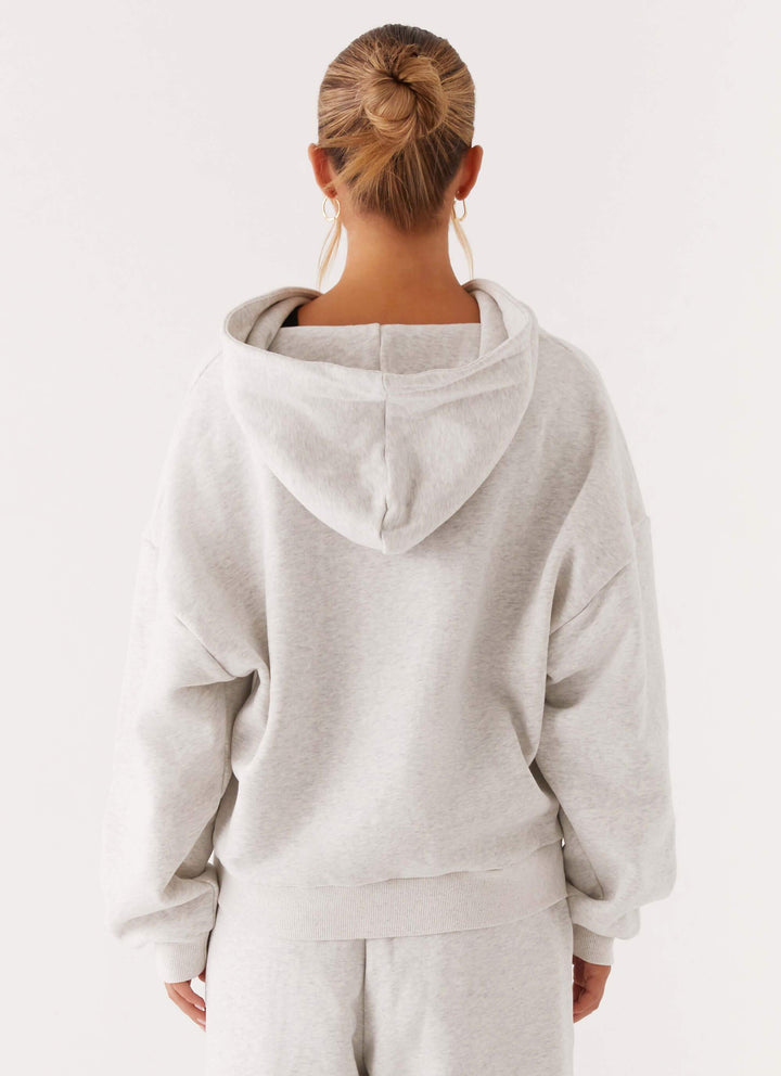 Women's grey hooded zip-up hoodie with front pockets