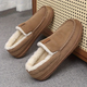 Men's lined slip-on moccasin slippers with plush trim and flat treaded soles