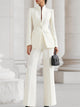 Women's tailored two-piece suit with stand-collar blazer and wide-leg trousers