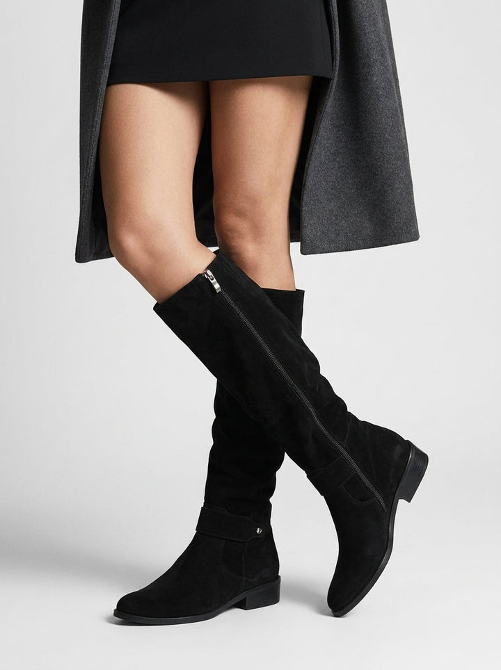 Women's knee high slouchy boots with buckle detail and low heel